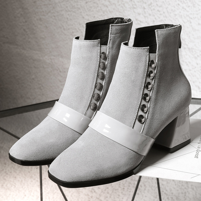 时尚与舒适并存 2017新款宾如意个性铆钉粗跟短靴